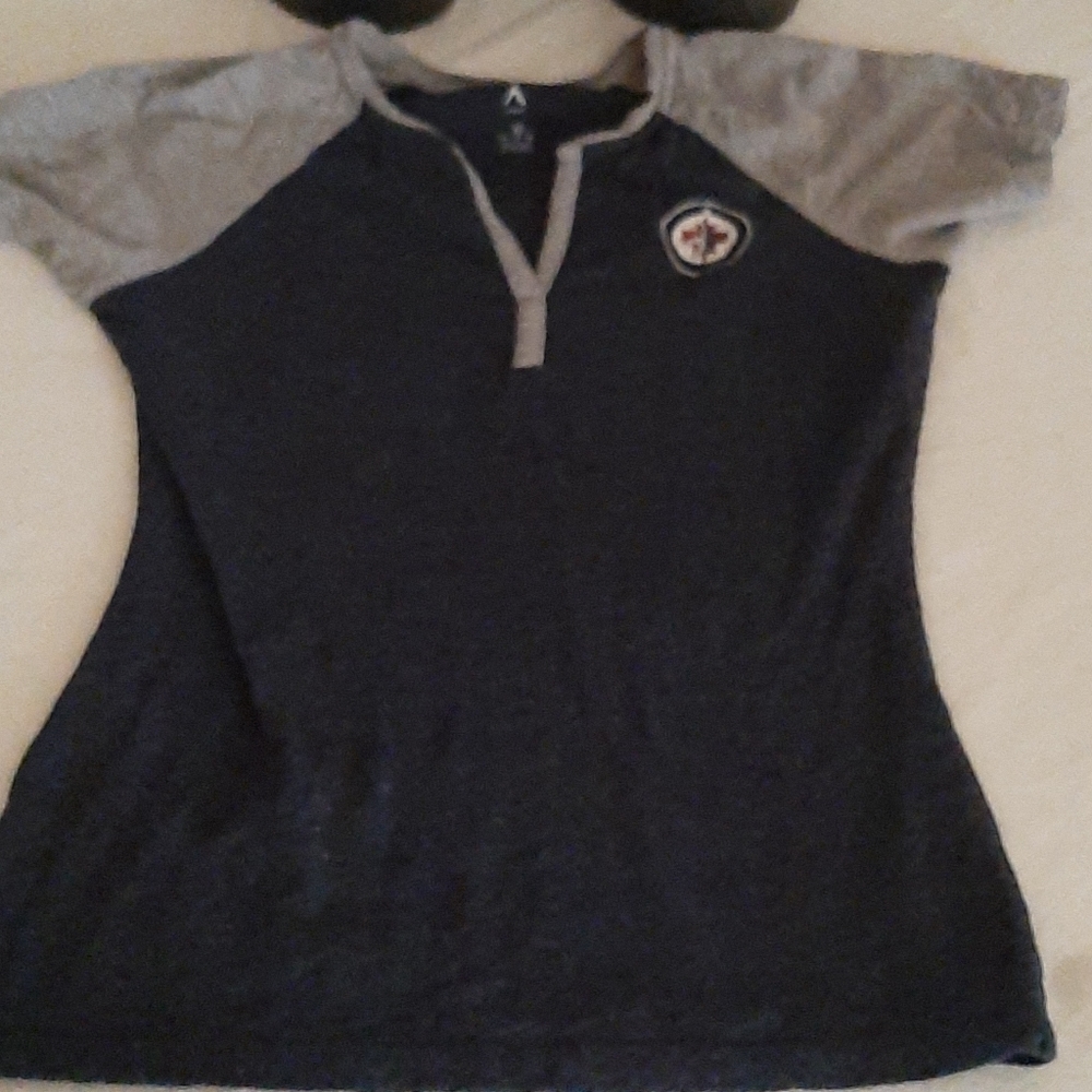 Size medium Antigua Brand Winnipeg Jets shirt